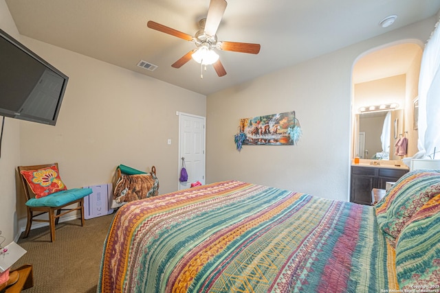 6018 Pearl Pass, San Antonio, TX 78222 - carpeted bedroom featuring a ceiling fan and ensuite bathroom