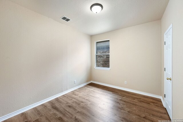 1905 Walter Raleigh, Windcrest, TX 78239 - empty room featuring wood finished floors and baseboards