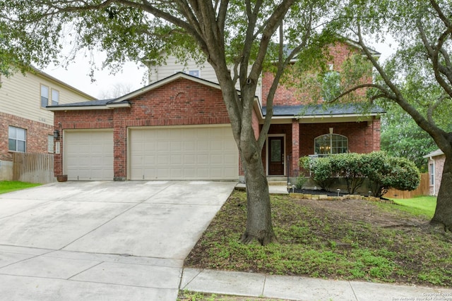 1154 Kite, New Braunfels, TX 78130 - view of front of property with an attached garage, brick siding, and driveway