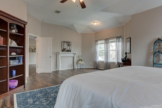 1154 Kite, New Braunfels, TX 78130 - bedroom featuring wood finished floors, vaulted ceiling, and a ceiling fan