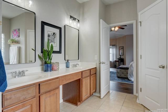 1154 Kite, New Braunfels, TX 78130 - ensuite bathroom with tile patterned flooring, double vanity, and a ceiling fan
