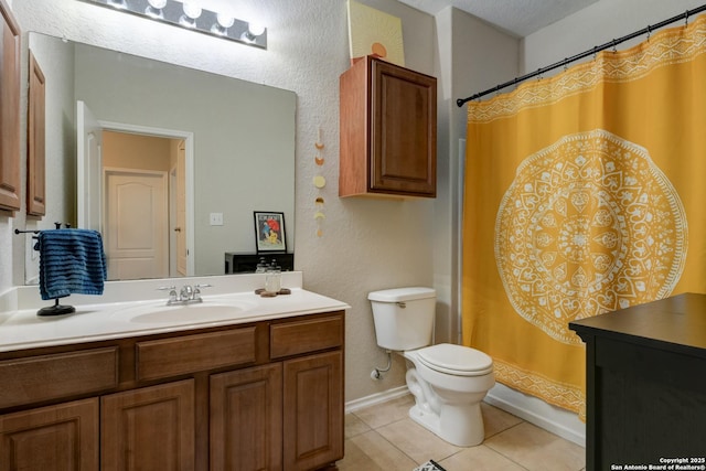 1154 Kite, New Braunfels, TX 78130 - bathroom featuring vanity, tile patterned flooring, a textured wall, and a shower with curtain