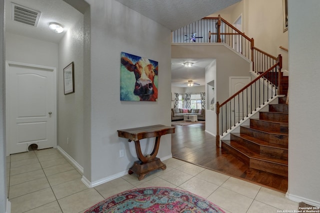 1154 Kite, New Braunfels, TX 78130 - tiled foyer with stairs and ceiling fan