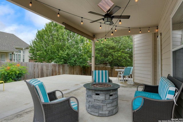 1154 Kite, New Braunfels, TX 78130 - fenced backyard featuring a fire pit, a patio area, and ceiling fan