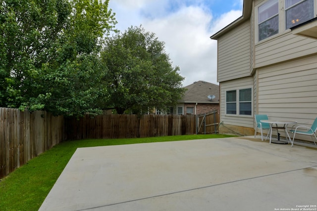 1154 Kite, New Braunfels, TX 78130 - fenced backyard with a patio