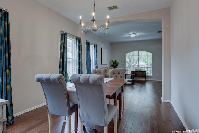 1154 Kite, New Braunfels, TX 78130 - dining space featuring a chandelier and dark wood-style flooring