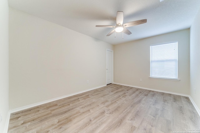 129 Sandy Shl, Boerne, TX 78006 - unfurnished room featuring light wood finished floors and ceiling fan