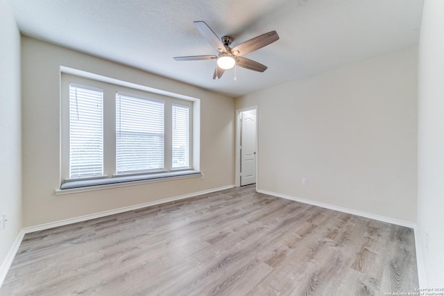 129 Sandy Shl, Boerne, TX 78006 - unfurnished room featuring a ceiling fan and light wood-style floors