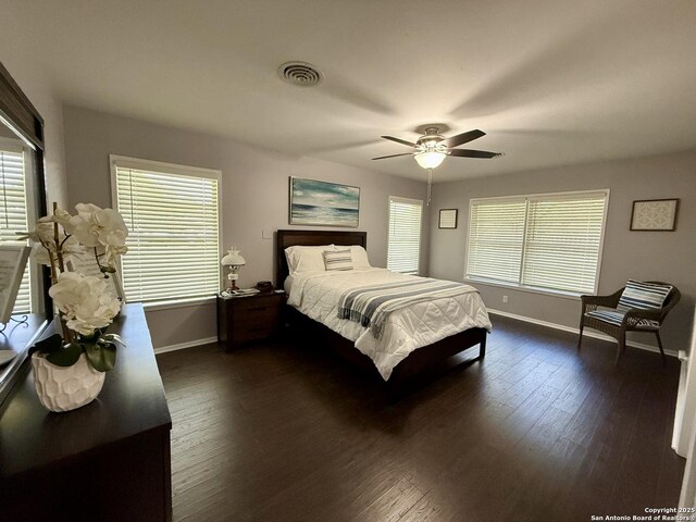 803 Leland, Kenedy, TX 78119 - bedroom with dark wood finished floors and ceiling fan