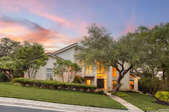 2915 Quail Oak, San Antonio, TX 78232 - mid-century modern home featuring a lawn and brick siding