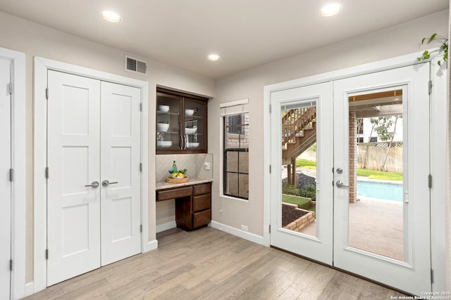 2915 Quail Oak, San Antonio, TX 78232 - doorway with french doors, light wood-style flooring, and recessed lighting