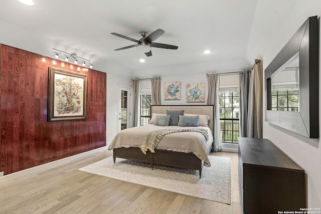 2915 Quail Oak, San Antonio, TX 78232 - bedroom featuring wood finished floors, recessed lighting, access to exterior, wood walls, and ceiling fan