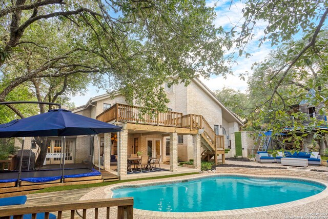 2915 Quail Oak, San Antonio, TX 78232 - outdoor pool with an outdoor living space, a wooden deck, french doors, a patio area, and stairway