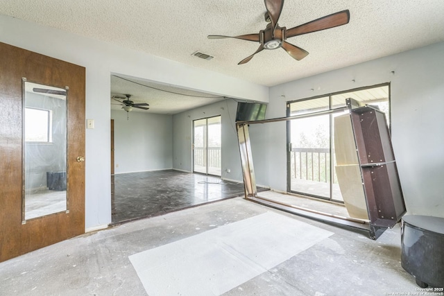 6231 Little Fawn, San Antonio, TX 78238 - empty room with a textured ceiling and ceiling fan