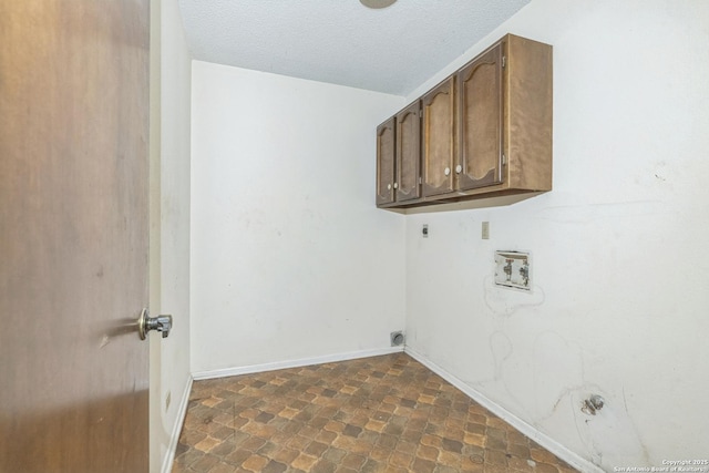 6231 Little Fawn, San Antonio, TX 78238 - washroom with hookup for an electric dryer, cabinet space, washer hookup, and a textured ceiling