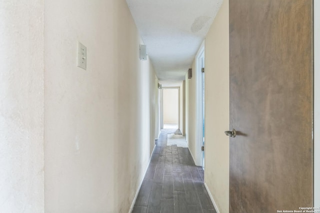 6231 Little Fawn, San Antonio, TX 78238 - corridor featuring dark wood-type flooring and baseboards