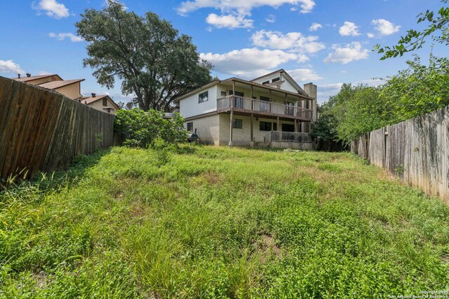 6231 Little Fawn, San Antonio, TX 78238 - back of property with a balcony and stucco siding
