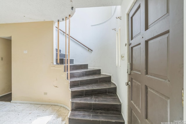 6231 Little Fawn, San Antonio, TX 78238 - staircase with baseboards