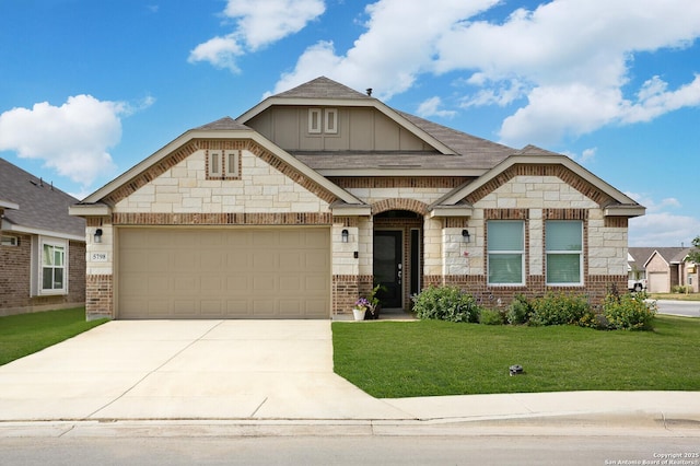 5798 Luciano Trl, Seguin, TX 78155 - view of front of house with a front yard, brick siding, driveway, an attached garage, and board and batten siding