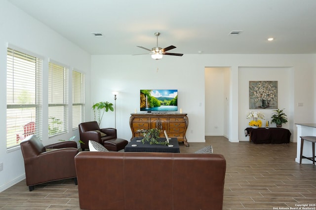 5798 Luciano Trl, Seguin, TX 78155 - living area featuring wood finish floors, ceiling fan, and recessed lighting