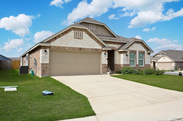 5798 Luciano Trl, Seguin, TX 78155 - view of front of house featuring an attached garage, brick siding, concrete driveway, and board and batten siding