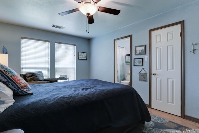 8822 Fernbrook, San Antonio, TX 78250 - bedroom featuring light wood-style floors, ensuite bathroom, and ceiling fan
