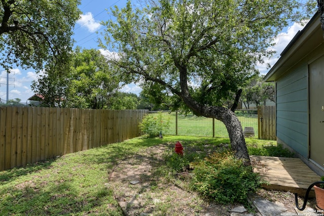 8822 Fernbrook, San Antonio, TX 78250 - fenced backyard featuring a wooden deck