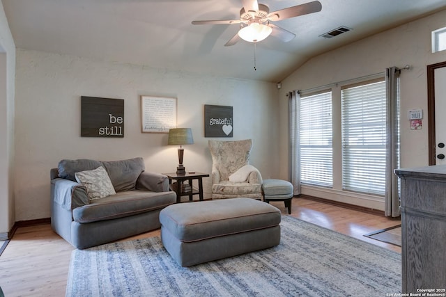 8822 Fernbrook, San Antonio, TX 78250 - living room featuring vaulted ceiling, a ceiling fan, and wood finished floors