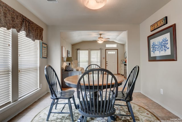 8822 Fernbrook, San Antonio, TX 78250 - dining space with ceiling fan, light tile patterned flooring, and vaulted ceiling