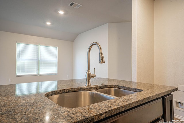7119 Magnolia Blf, San Antonio, TX 78218 - kitchen with dark stone countertops and recessed lighting