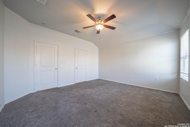 7119 Magnolia Blf, San Antonio, TX 78218 - unfurnished bedroom featuring carpet floors, ceiling fan, and vaulted ceiling