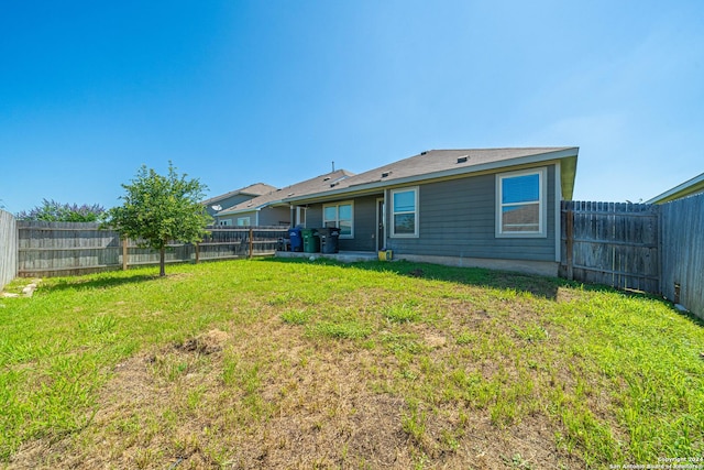 7119 Magnolia Blf, San Antonio, TX 78218 - rear view of house featuring a fenced backyard