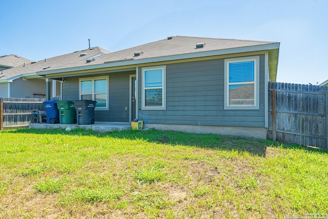 7119 Magnolia Blf, San Antonio, TX 78218 - back of house featuring a fenced backyard and a patio area