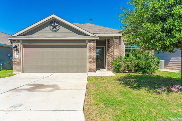 7119 Magnolia Blf, San Antonio, TX 78218 - view of front of home featuring brick siding, concrete driveway, a garage, and a front yard