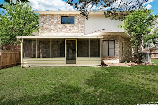 13322 Galicia, Universal City, TX 78148 - rear view of property featuring a sunroom and brick siding