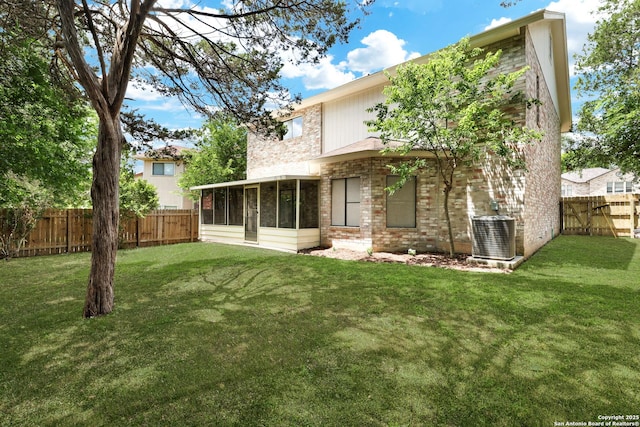 13322 Galicia, Universal City, TX 78148 - back of property with a sunroom, a fenced backyard, and brick siding