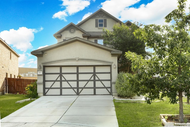 561 Dusty Emerald, Universal City, TX 78148 - view of front of home featuring stucco siding, concrete driveway, and an attached garage