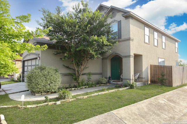 561 Dusty Emerald, Universal City, TX 78148 - view of front of house featuring stucco siding and an attached garage