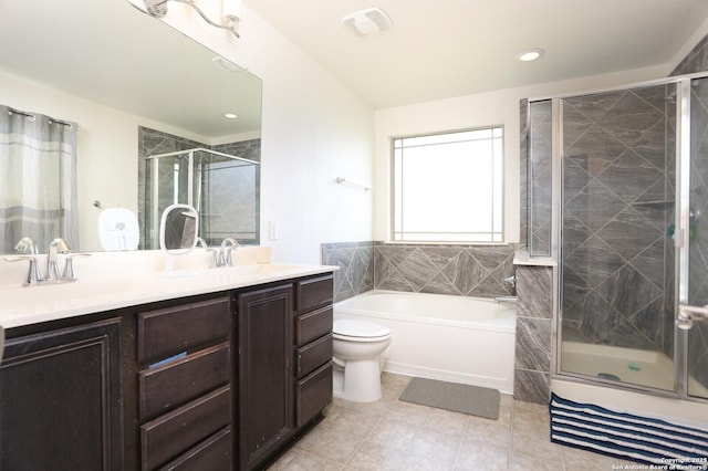 561 Dusty Emerald, Universal City, TX 78148 - bathroom featuring a stall shower, double vanity, a garden tub, and tile patterned floors