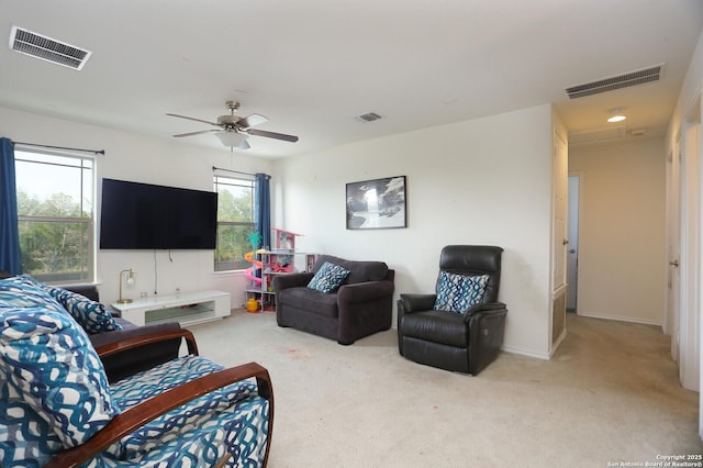 561 Dusty Emerald, Universal City, TX 78148 - living room featuring light colored carpet and ceiling fan