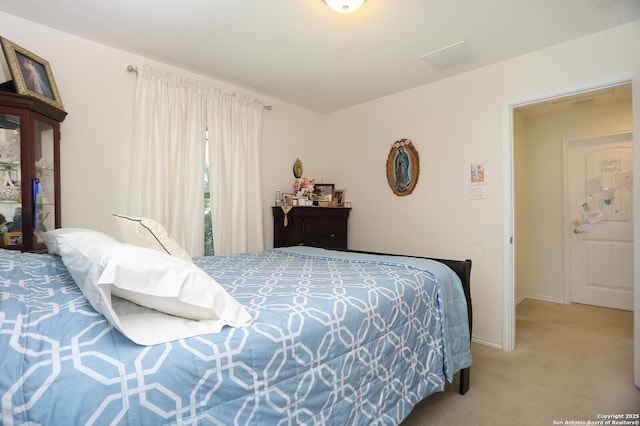561 Dusty Emerald, Universal City, TX 78148 - bedroom with light colored carpet and baseboards