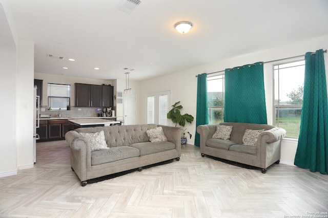 561 Dusty Emerald, Universal City, TX 78148 - living room with recessed lighting and baseboards