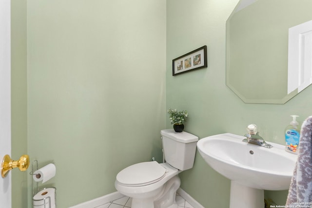 2611 Menard, San Antonio, TX 78251 - half bathroom featuring toilet and tile patterned flooring