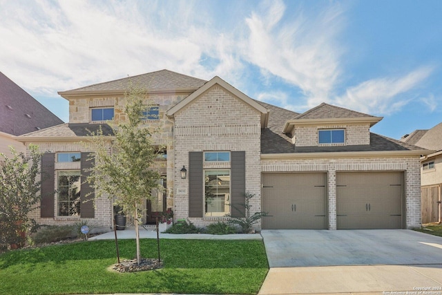 9032 Raven Pointe, San Antonio, TX 78255 - french country style house with an attached garage, brick siding, a front yard, concrete driveway, and a shingled roof