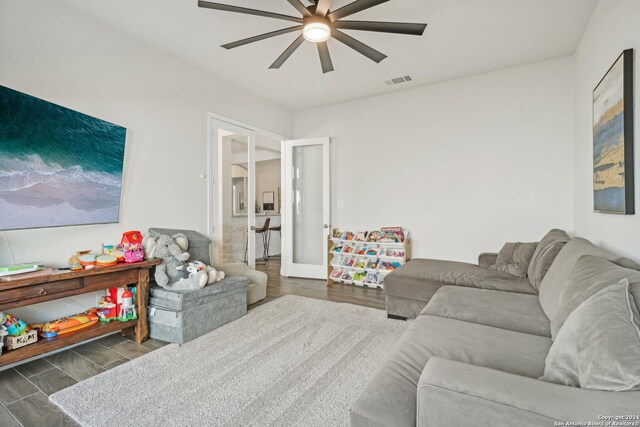 9032 Raven Pointe, San Antonio, TX 78255 - living area featuring a ceiling fan and wood finished floors