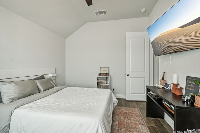 9032 Raven Pointe, San Antonio, TX 78255 - bedroom with dark wood-style flooring, vaulted ceiling, and a ceiling fan