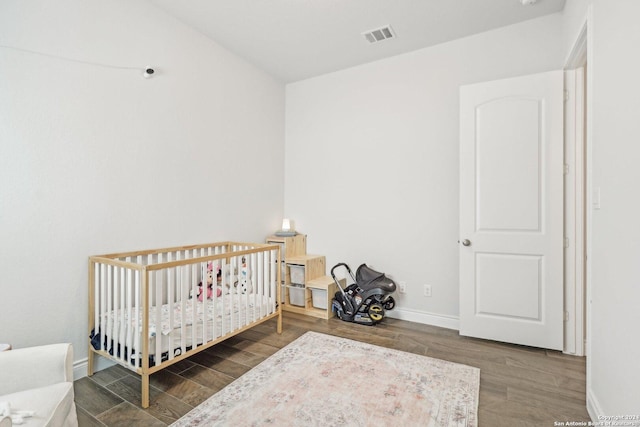 9032 Raven Pointe, San Antonio, TX 78255 - bedroom with wood finished floors and a nursery area