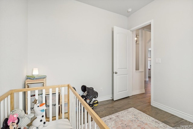 9032 Raven Pointe, San Antonio, TX 78255 - bedroom featuring wood finished floors and a nursery area