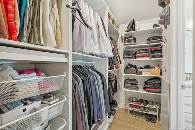 9032 Raven Pointe, San Antonio, TX 78255 - spacious closet with wood finished floors