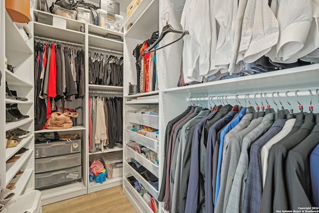 9032 Raven Pointe, San Antonio, TX 78255 - spacious closet featuring wood finished floors